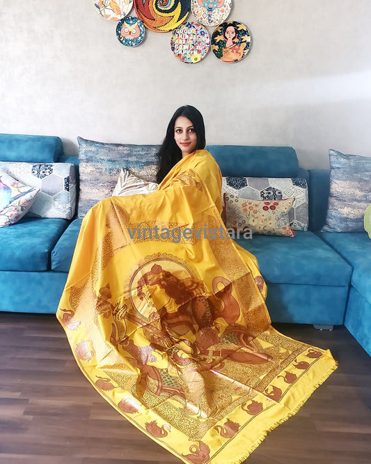 Handpainted Saraswati Pattachitra Saree in Pure Silk Yellow with Bronze painting