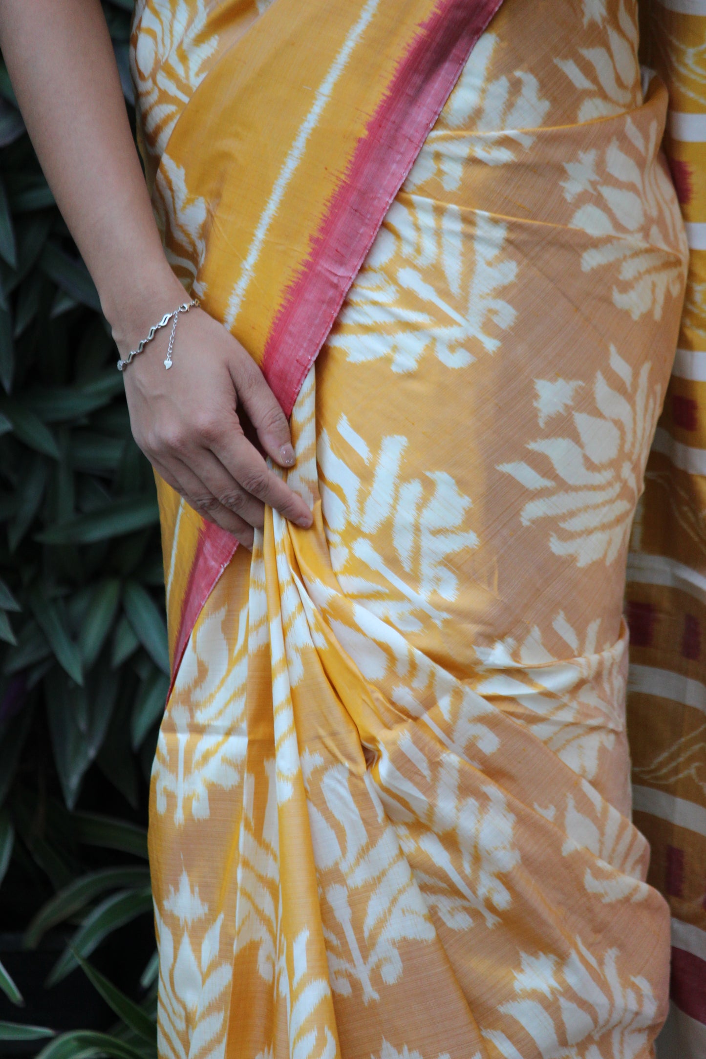 'Pundarika' Ikkat pattern lotus motifs handwoven pure Mulberry silk Yellow saree