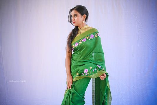 'Kamala' handwoven and handpainted Green Moonga Silk Saree.